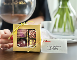 Four Piece Hand Made Truffles In Box