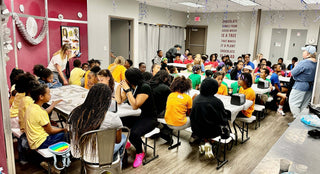 School group on a chocolate factory field trip at Chamberlain's Chocolate Factory in Roswell, GA near Atlanta