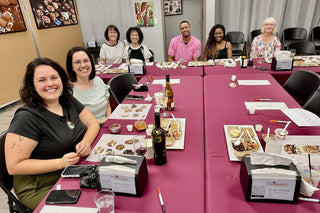 Couple enjoying a chocolate making date night class at Chamberlain's Chocolate Factory in Roswell, GA