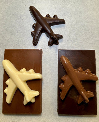 Milk chocolate molded airplane and chocolate bar, gift packaged. Atlanta