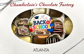 Chamberlain's Chocolate Factory Back to School assortment box with molded Oreo centerpiece, sprinkle chocolates, and striped truffles, made in Atlanta in a peanut-free facility
