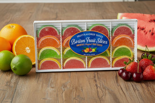 Boston Fruit Slices Variety Tray with colorful jelly fruit slices displayed on a wooden table.