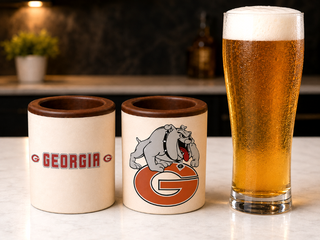 Set of 2 milk chocolate shot glasses with Georgia Bulldogs edible print — one with team name, one with logo, made at Chamberlain's in Roswell, GA