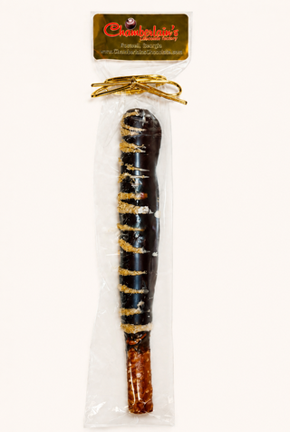 Dark Chocolate covered pretzel rods, each gift packaged in a clear bag with a gold bow. Chamberlains Chocolate Factory in Atlanta