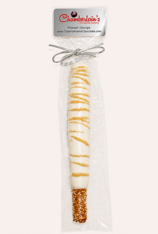 White Chocolate covered pretzel rods, each gift packaged in a clear bag with a silver bow. Chamberlains Chocolate Factory in Atlanta