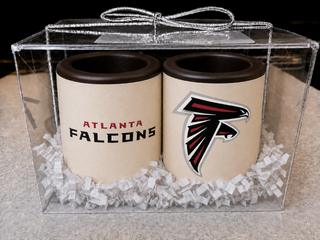 Set of 2 dark chocolate shot glasses with Atlanta Falcons edible print — one with team name, one with logo — gift boxed in a clear acrylic box with silver bow, made at Chamberlain's in Roswell, GA