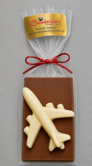 Chocolate Molded Airplane With Solid Chocolate Bar, Gift Packaged with red bow by Chamberlains Chocolate Factory Atlanta