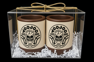 Set of 2 custom chocolate shot glasses with edible company logo and white crinkle paper in a clear acrylic gift box with silver bow, corporate client gift by Chamberlain's Chocolate, Atlanta GA