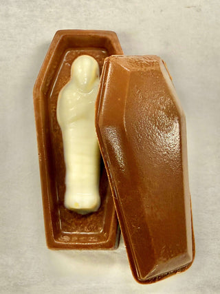 Milk chocolate coffin opened to reveal a white chocolate mummy figure inside — Chamberlains Chocolate Factory Halloween chocolate
