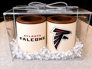 Set of 2 milk chocolate shot glasses with Atlanta Falcons edible print — one with team name, one with logo — gift boxed in a clear acrylic box with silver bow, made at Chamberlain's in Roswell, GA