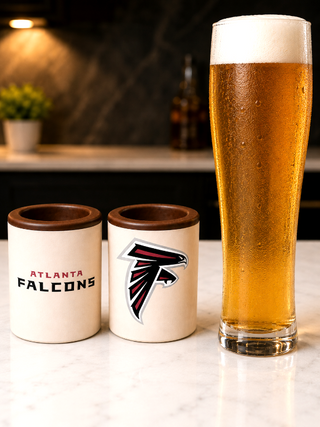 Set of 2 milk chocolate shot glasses with Atlanta Falcons edible print — one with team name, one with logo — made at Chamberlain's in Roswell, GA