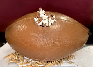 Milk Chocolate Life Size Football filled with popcorn and crafted in chocolate, gift bagged for special occasions.