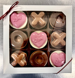 Nine Valentine Love Chocolate Oreos and Molded Chocolates in a gift box with heart, X, and O shapes.