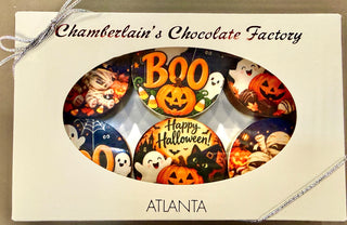 Chamberlain’s Halloween chocolate-covered Oreo gift box with six cookies featuring Boo, ghost, pumpkin, and mummy designs