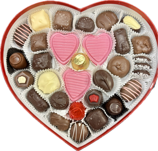 Two Pound Valentine Heart Chocolate Box filled with assorted chocolates, including pink hearts, caramels, and creamy delights.
