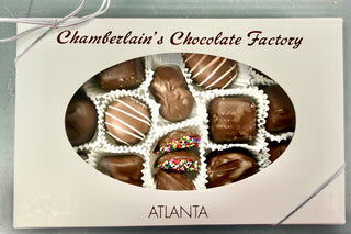Half-pound gourmet chocolate gift box with butter creams, caramels & fruit flavors. Peanut-free, made in Roswell GA. Local pickup or nationwide shipping.