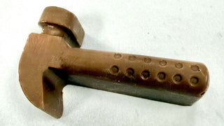 Hand Molded Chocolate Hammer Gift Wrapped, brown chocolate hammer shaped like a tool, perfect for gifting.