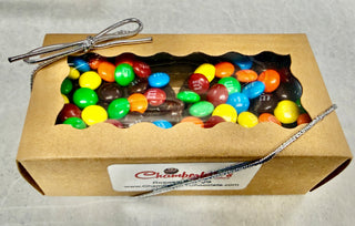 Chocolate Molded Oreos with M&M Candies gift box filled with colorful mini M&M candies.