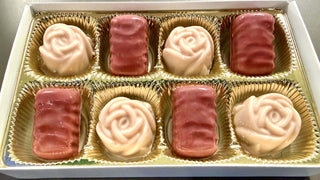 Hand Crafted Ruby Chocolate Dark Ganache Truffles and Strawberry Shortcake Truffles in an elegant box.