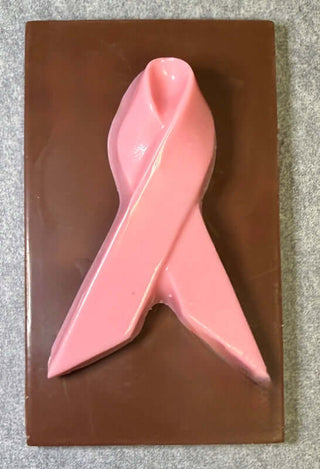 Breast Cancer Awareness Small Chocolate Bar featuring a 3.25" x 2" solid chocolate bar with a solid Pink Chocolate breast cancer awareness ribbon from Chamberlains Chocolate Factory